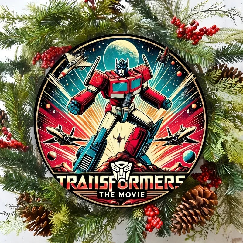 Décoration ronde Optimus Prime rouge et bleu sur fond spatial avec avions, entourée de branches de pin – Transformers.