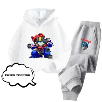 Ensemble enfant blanc et gris avec Optimus Prime coloré en posture dynamique sur fond uni – Transformers.