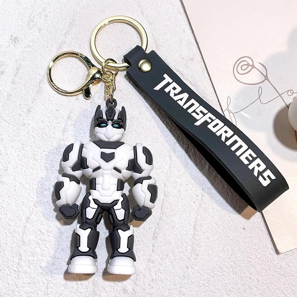 Porte-clés robot noir et blanc avec figurine stylisée, lanière noire TRANSFORMERS – Transformers.