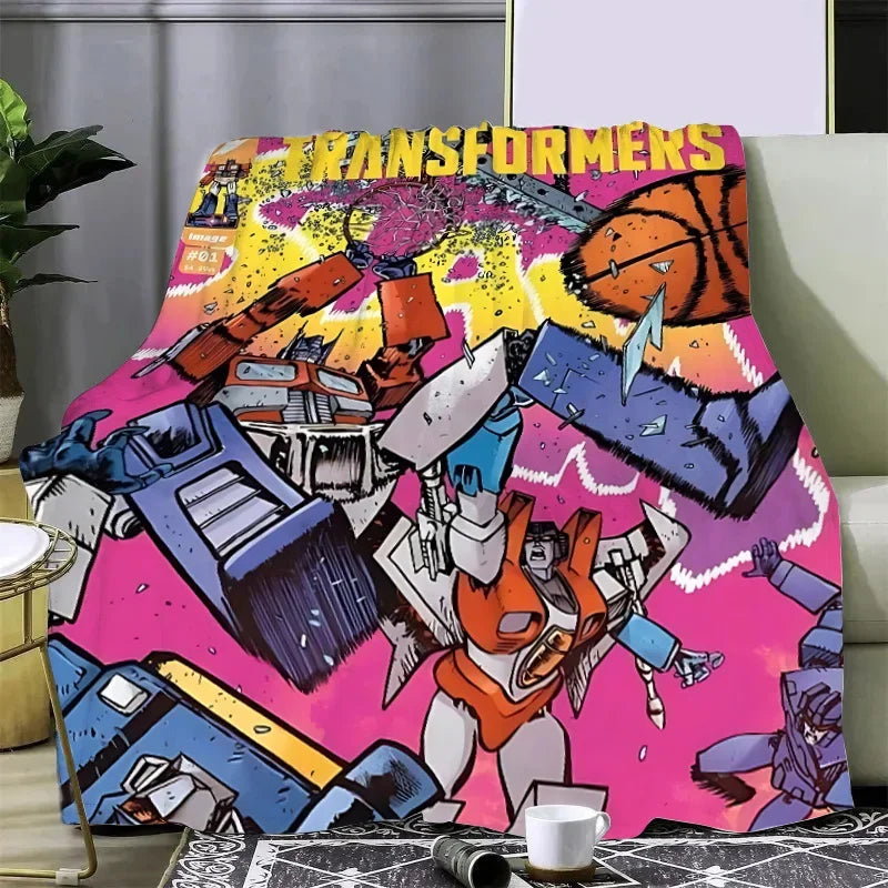 Couverture colorée avec robots Transformers en action, ballon de basket et fond rose vif – Transformers.