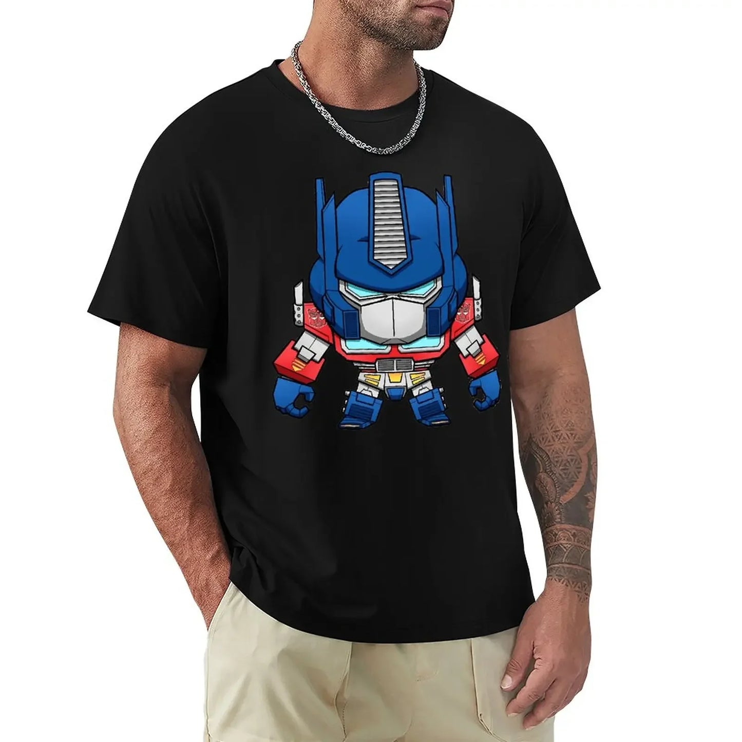 T-shirt noir avec dessin stylisé d'Optimus Prime en pose frontale, style cartoon – Transformers.