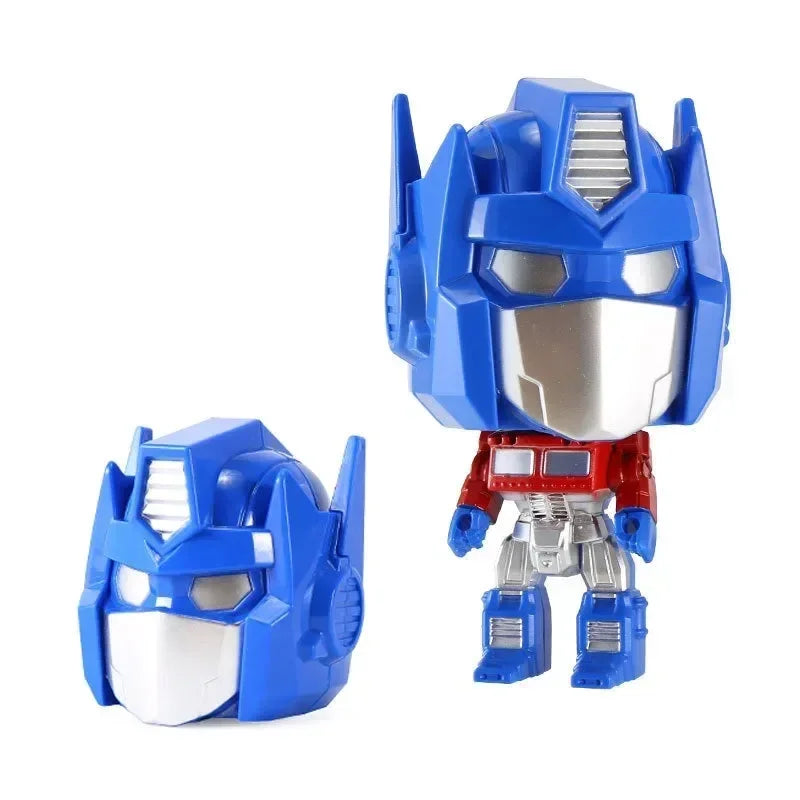 Figurine Optimus Prime vinyle bleu et rouge avec tête amovible sur fond blanc – Transformers.