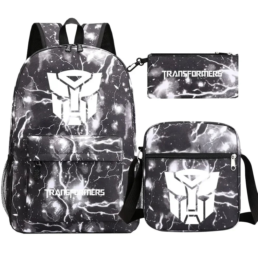 Ensemble sac à dos, sacoche et trousse noirs motif éclair logo Autobots blanc – Transformers.