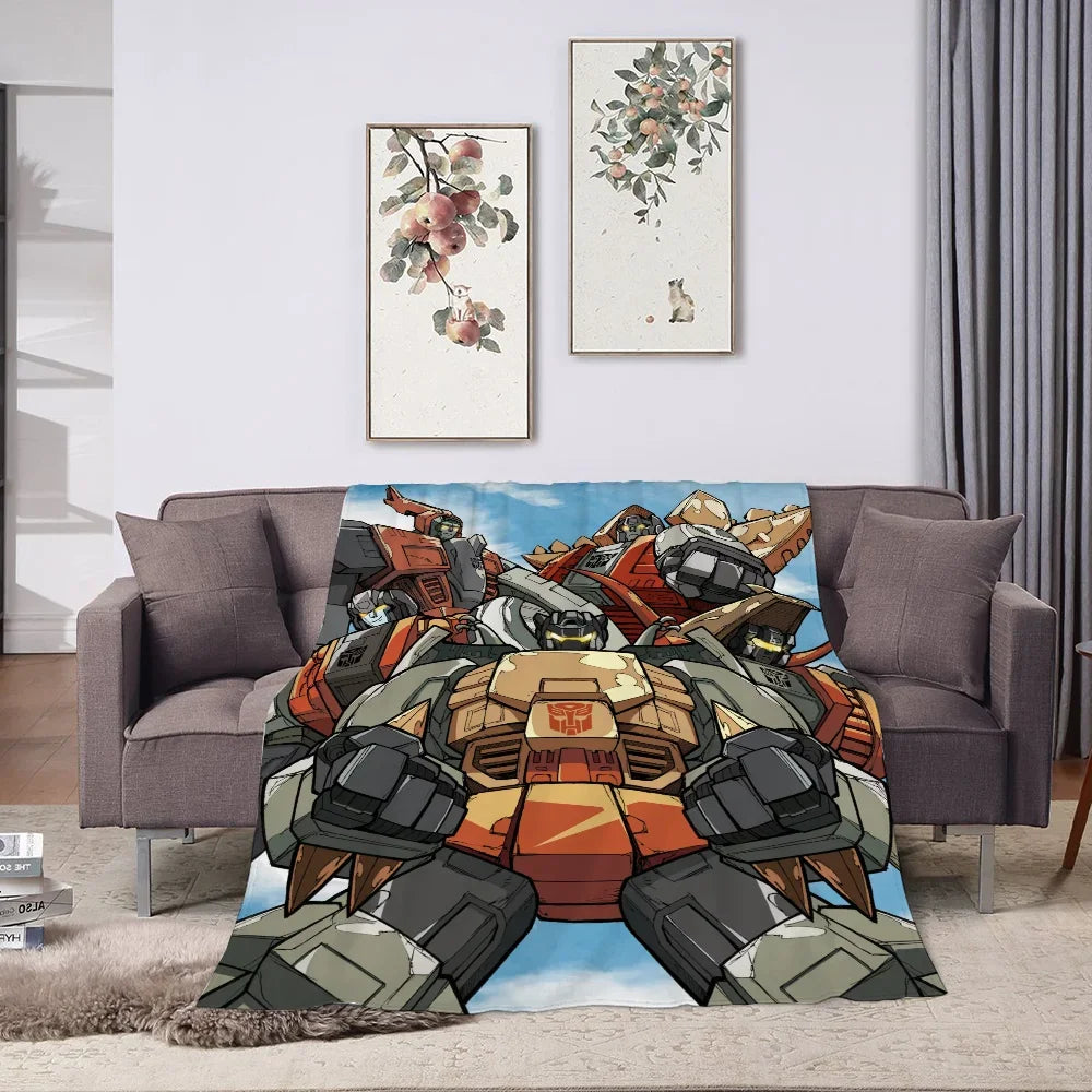 Plaid décoratif avec robot Dinobot couleur orange et gris, style dessin animé, posé sur canapé – Transformers.