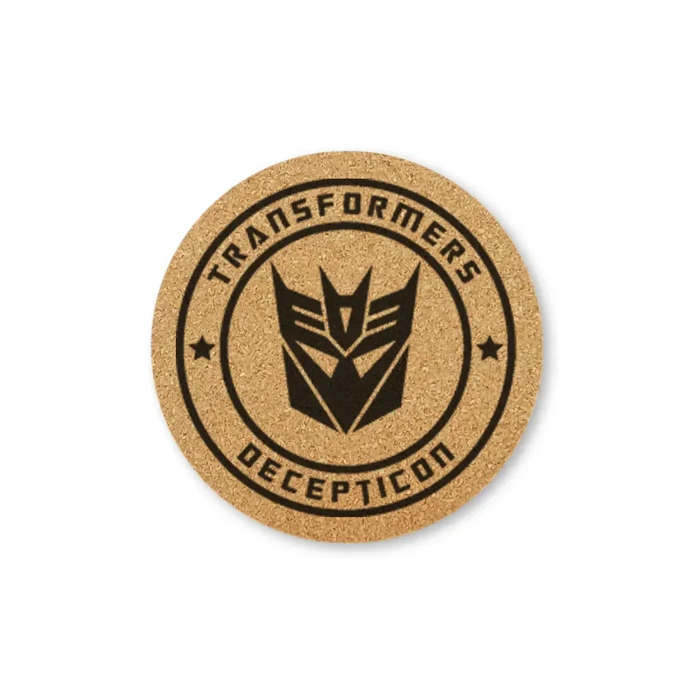Dessous de verre rond en liège, logo Decepticon noir, style moderne sur fond blanc – Transformers.
