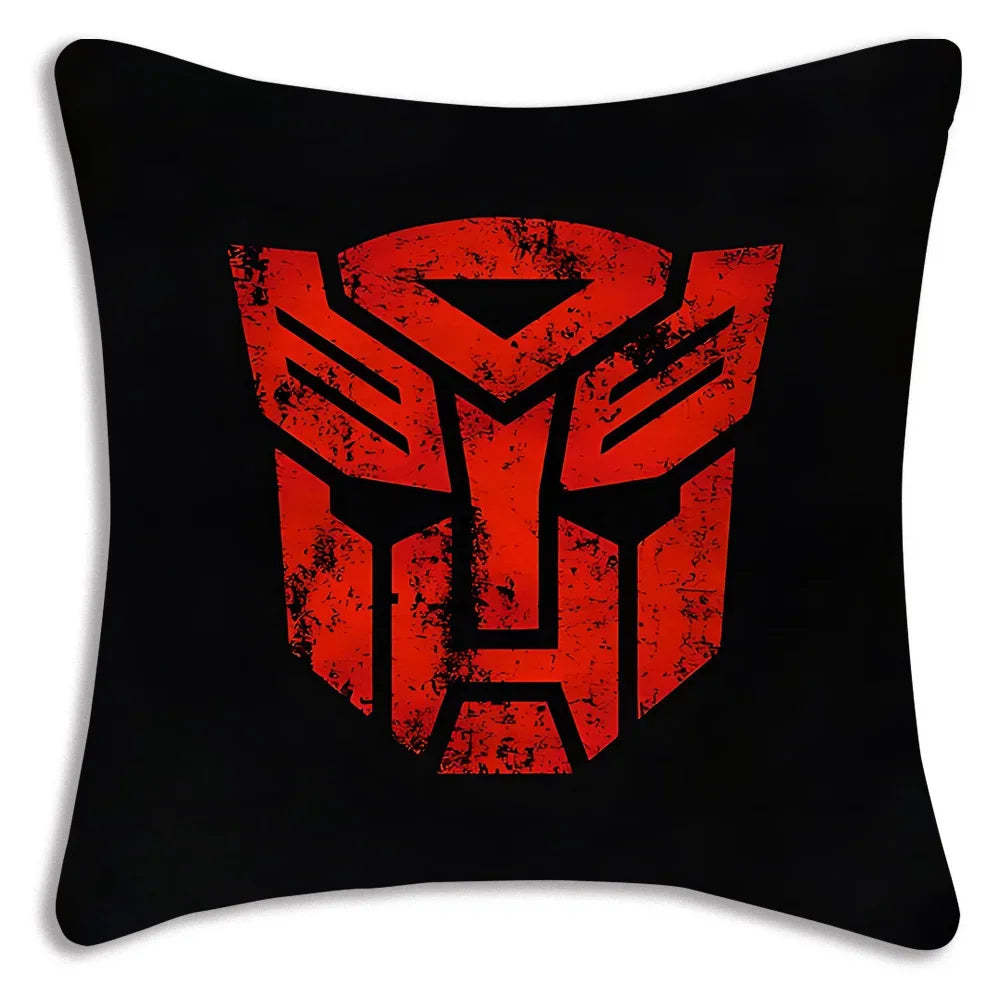 Coussin noir avec logo Autobots rouge usé au centre, style moderne – Transformers.
