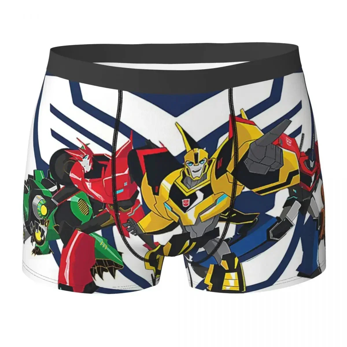 Boxer enfant à motif robots colorés en position dynamique sur fond blanc et bleu – Transformers.