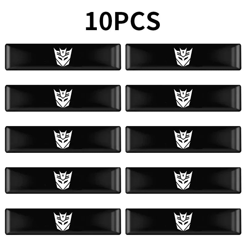 Lot de 10 autocollants noirs logo Decepticon blanc, rectangulaires, alignés – Transformers.