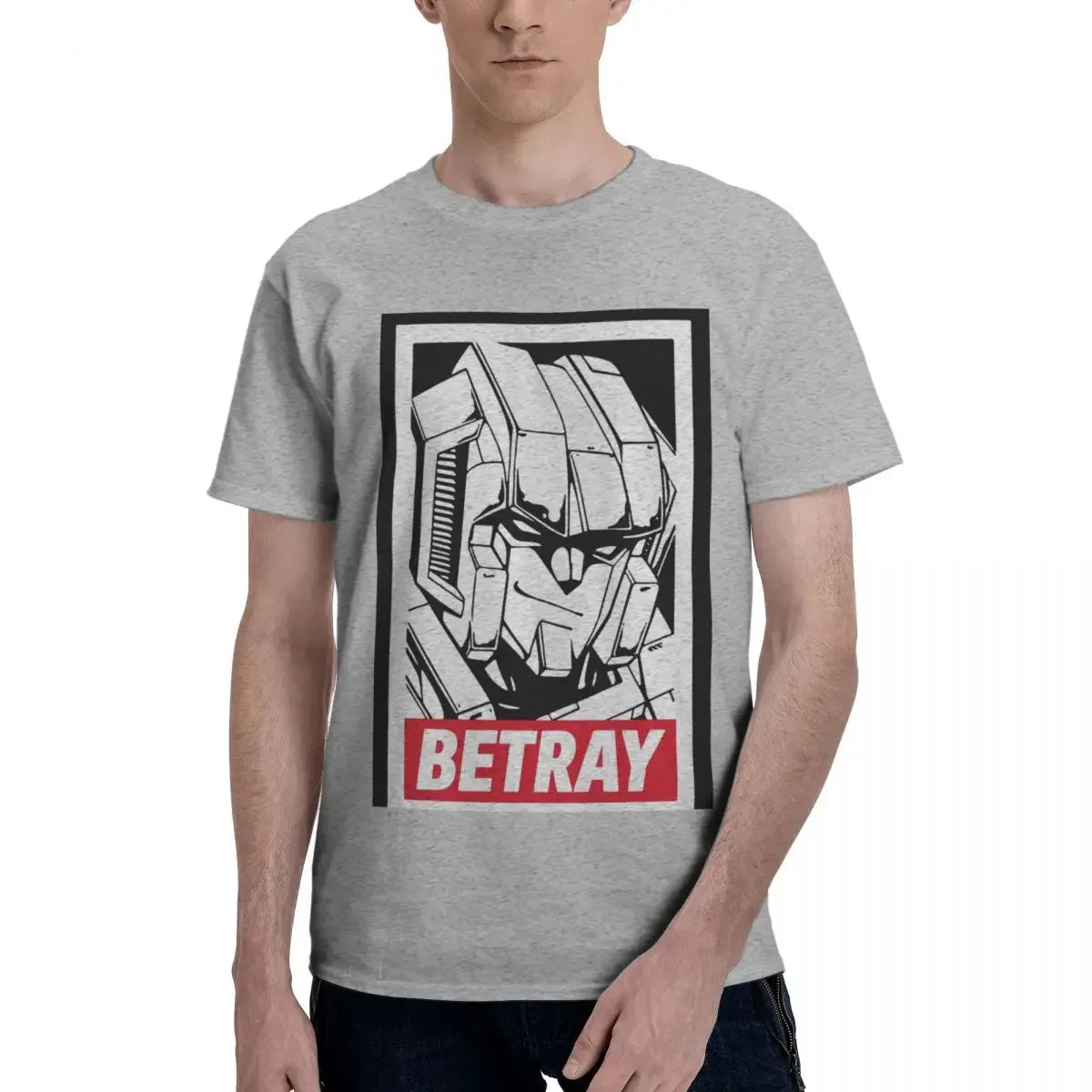 T-shirt gris avec dessin de Megatron stylisé et texte BETRAY en rouge – Transformers.