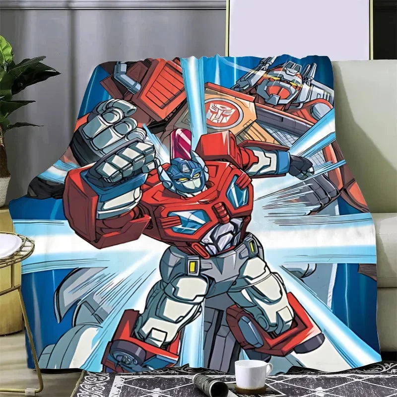 Plaid à motif Optimus Prime rouge et bleu en action, style cartoon, lumière bleue – Transformers.
