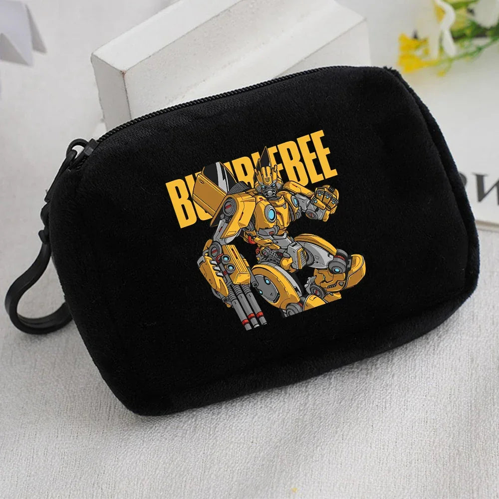 Trousse noire avec illustration de Bumblebee jaune, design robot détaillé sur tissu – Transformers.