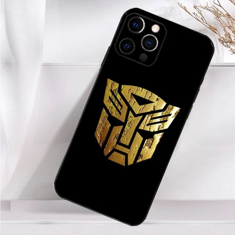 Coque de téléphone noire avec logo doré Autobots, texture métallique, décor minimaliste – Transformers.
