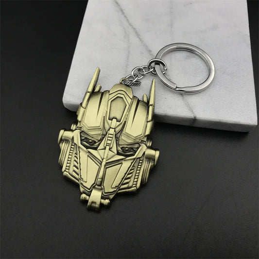 Llavero de Transformers - Logotipo de Megatron dorado